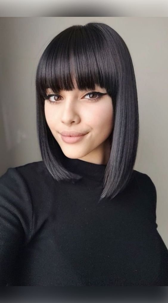 short butterfly haircut with bangs  