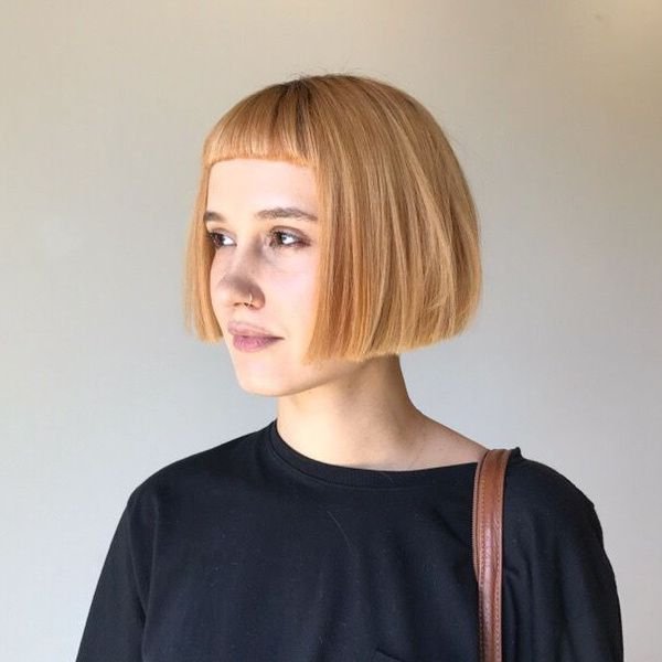 short butterfly haircut with bangs  